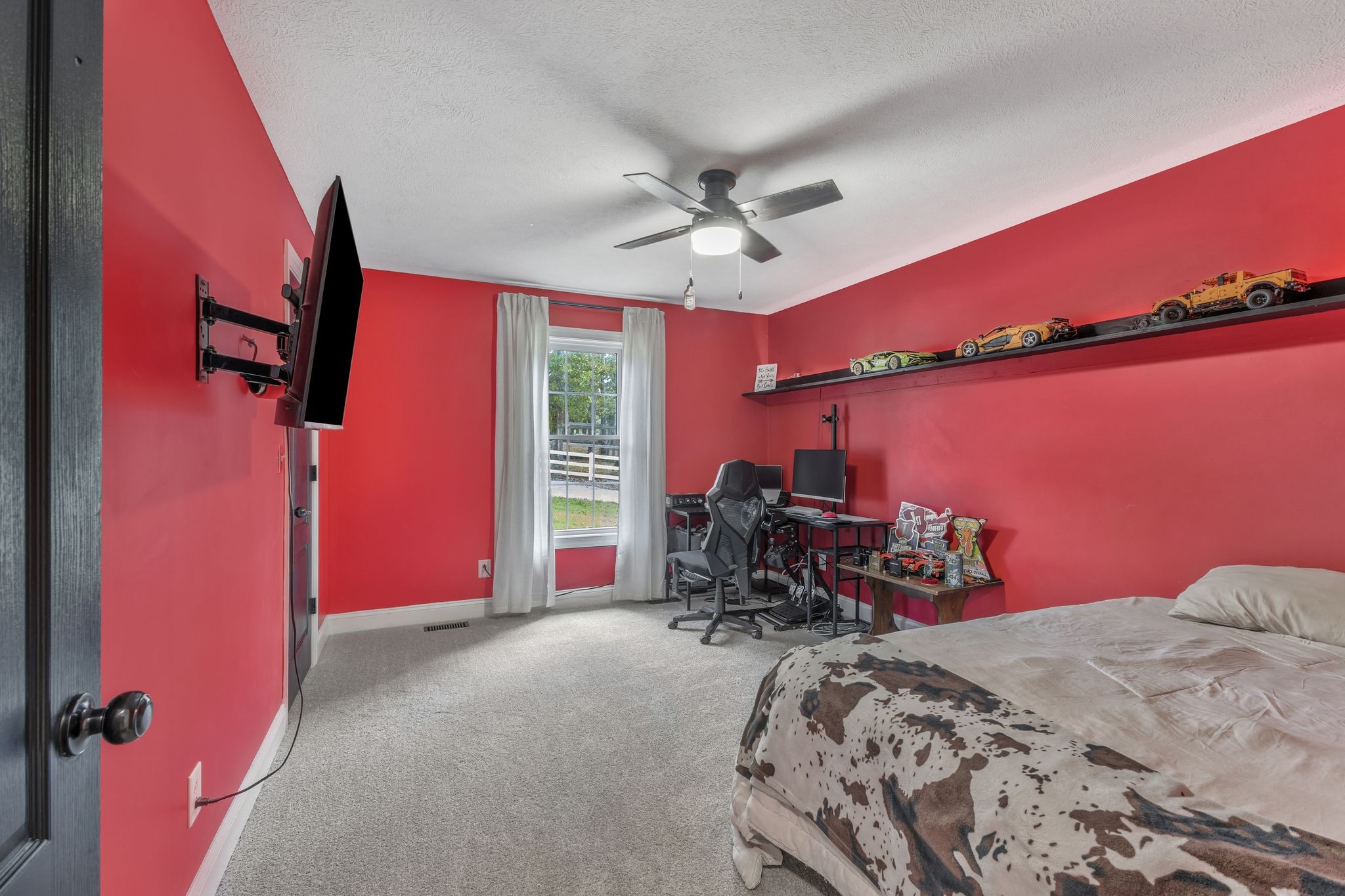 1745 Ennis Branch Road McEwen, TN 37101 - Photo 20 of 85 a bed room with a bed and a chair