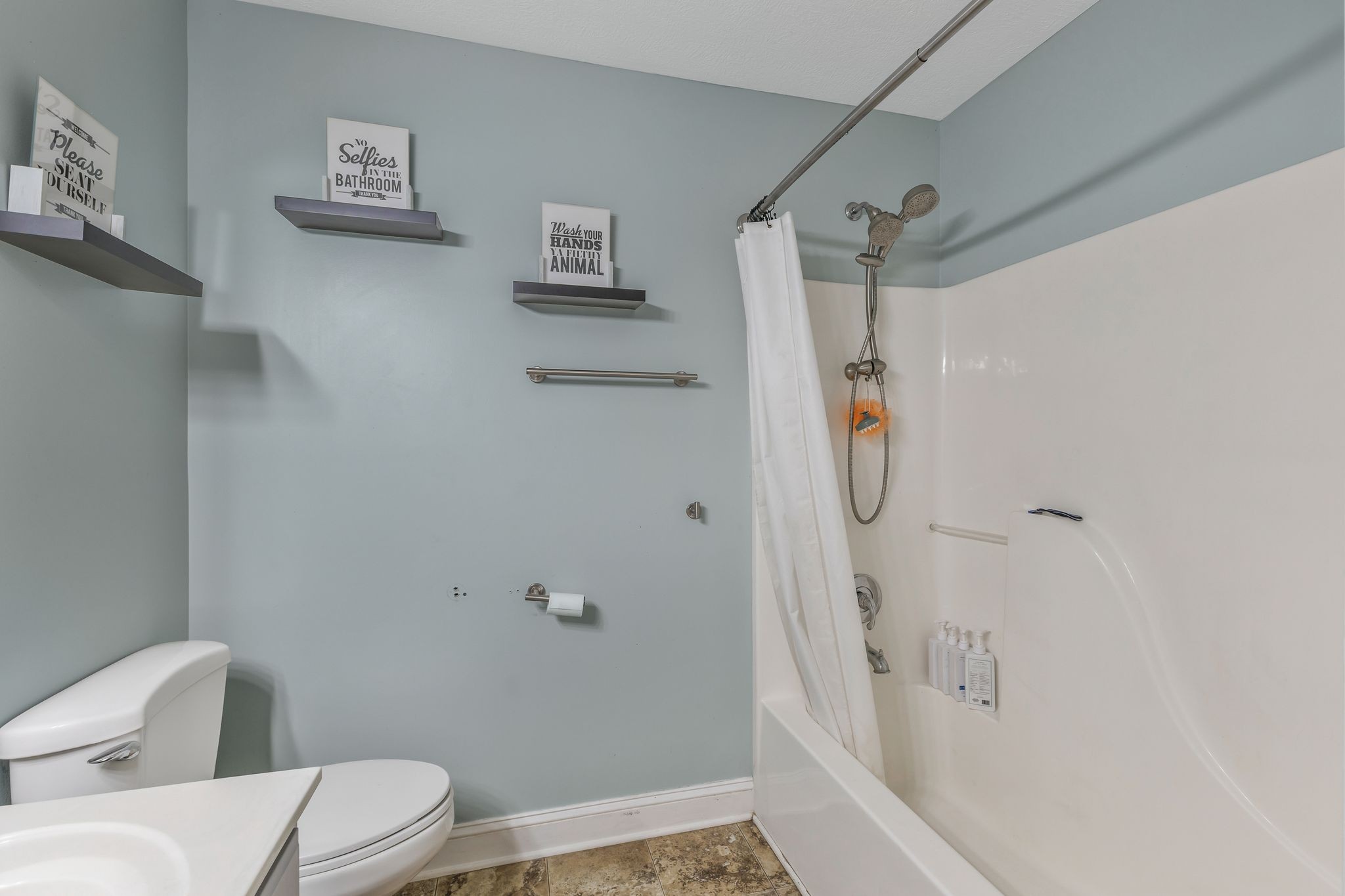 1745 Ennis Branch Road McEwen, TN 37101 - Photo 22 of 85 a bathroom with a toilet and a shower