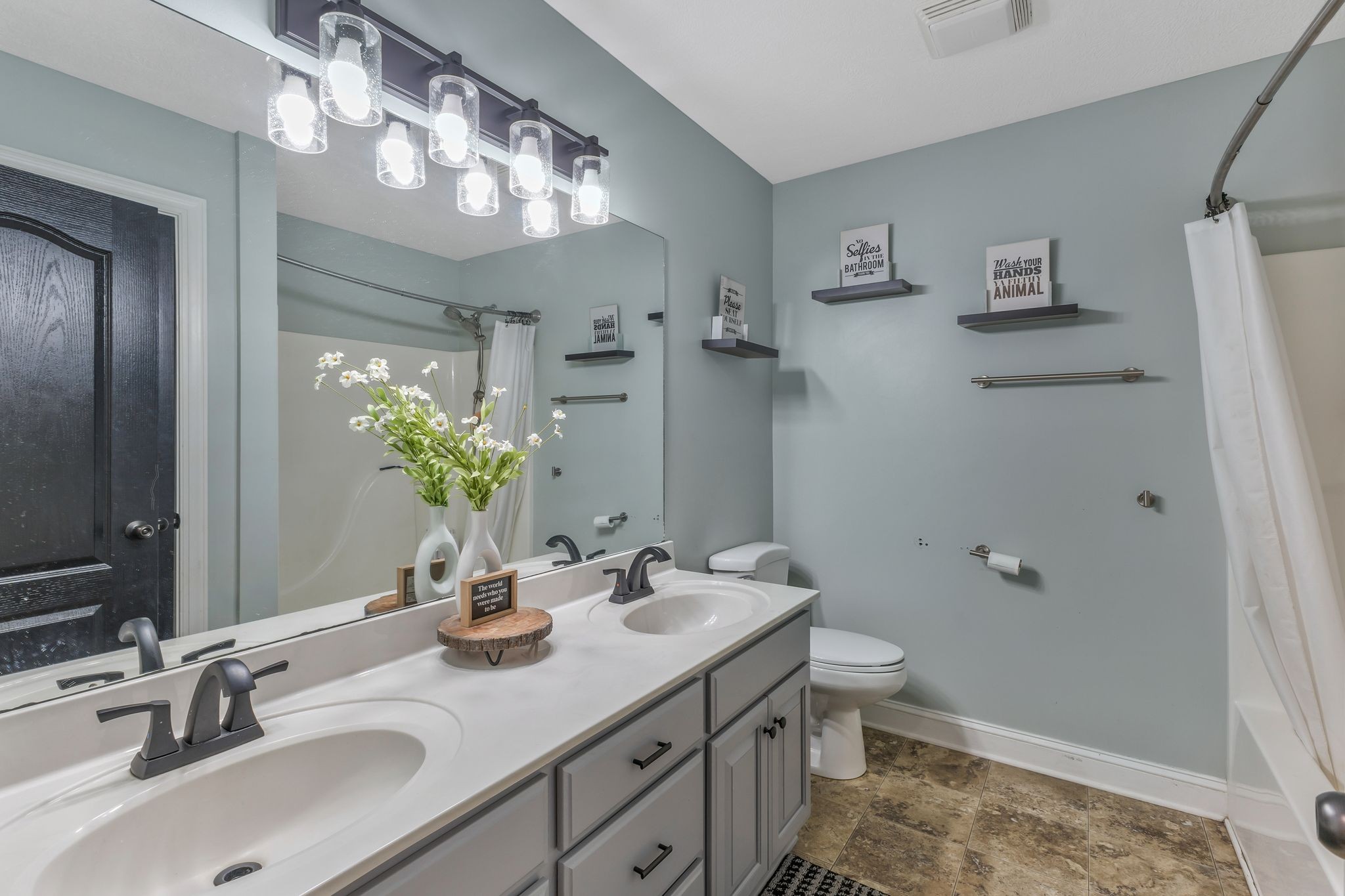 1745 Ennis Branch Road McEwen, TN 37101 - Photo 23 of 85 a bathroom with a sink double vanity and a mirror
