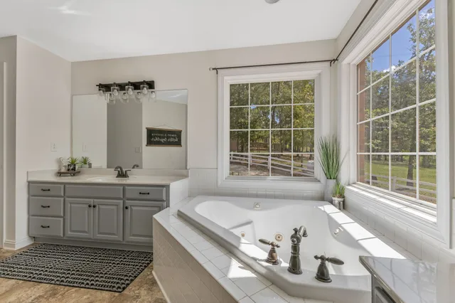 a dining room with furniture and a garden