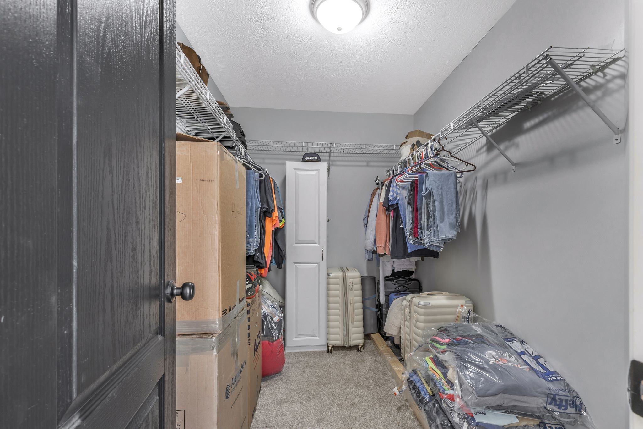 1745 Ennis Branch Road McEwen, TN 37101 - Photo 30 of 85 a view of walk in closet with clothes and shoes