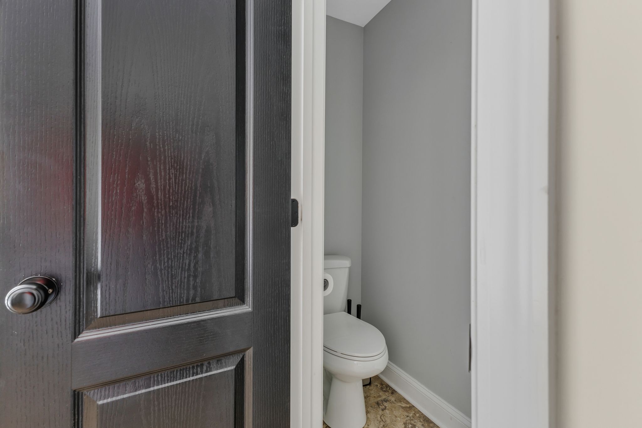 1745 Ennis Branch Road McEwen, TN 37101 - Photo 33 of 85 a bathroom with a granite countertop toilet and a sink