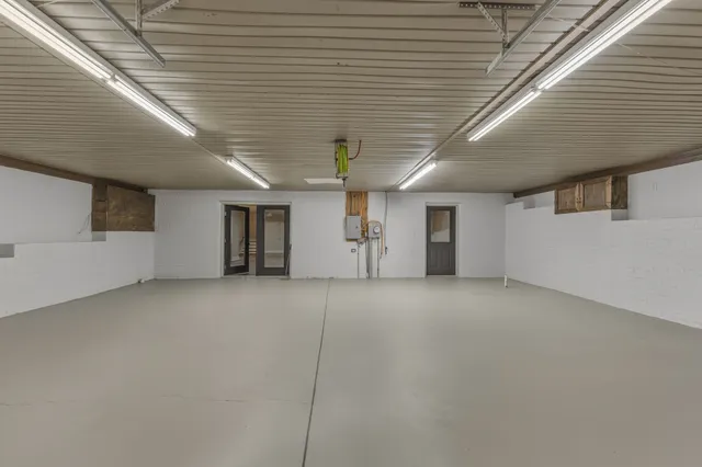 a bedroom with a bed and a walk in closet