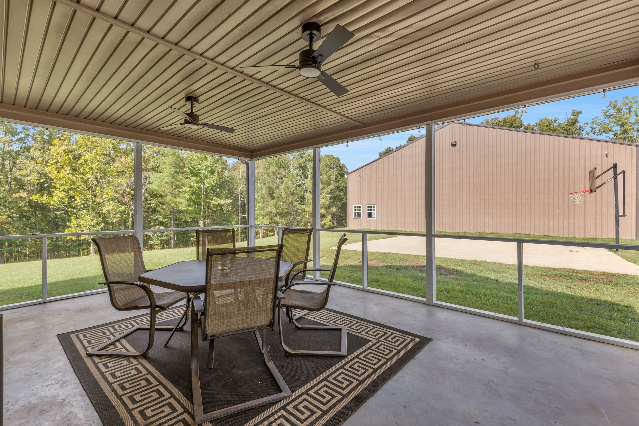 1745 Ennis Branch Road McEwen, TN 37101 - Photo 52 of 85 a view of a porch with furniture and floor to ceiling window
