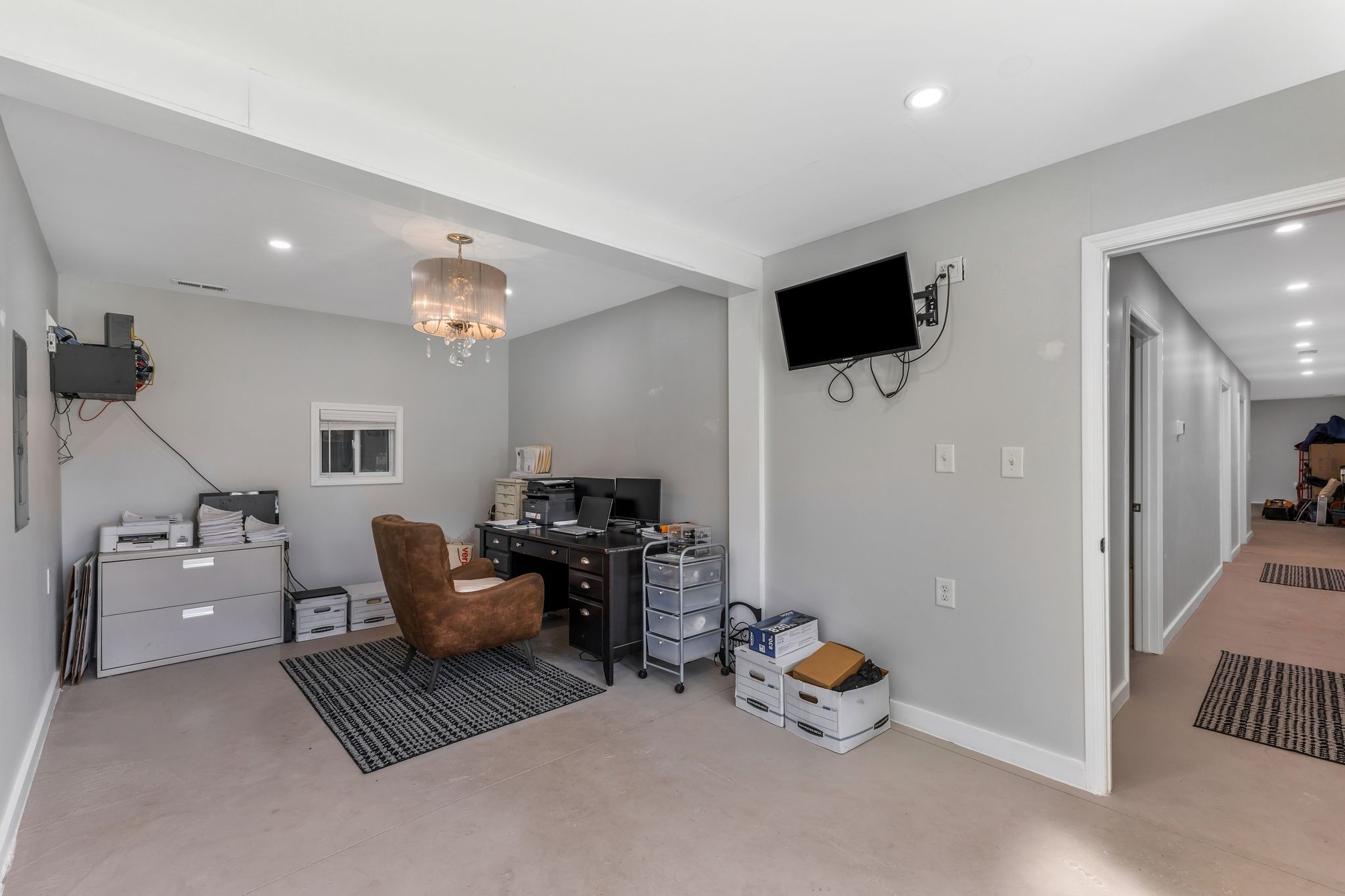 1745 Ennis Branch Road McEwen, TN 37101 - Photo 70 of 85 a dining room with furniture and a chandelier