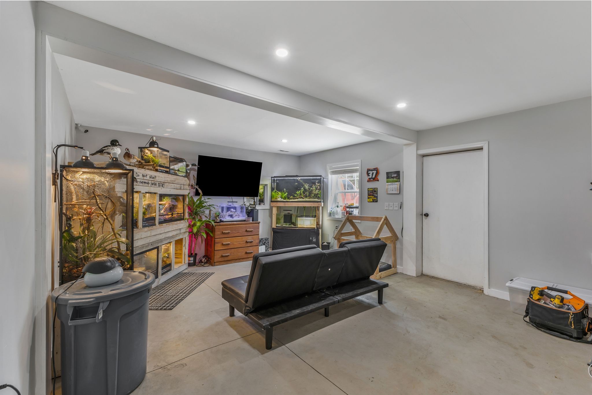 1745 Ennis Branch Road McEwen, TN 37101 - Photo 72 of 85 a living room with furniture and a flat screen tv
