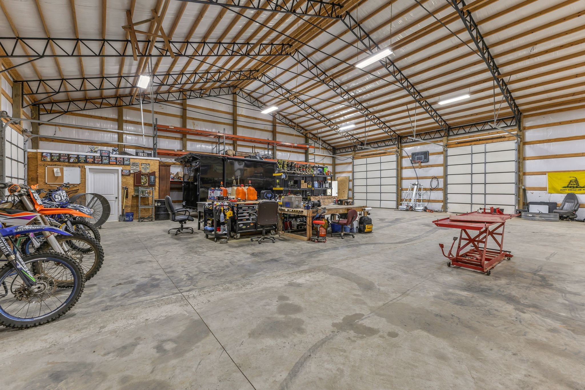 1745 Ennis Branch Road McEwen, TN 37101 - Photo 79 of 85 a view of a storage room with gym equipment