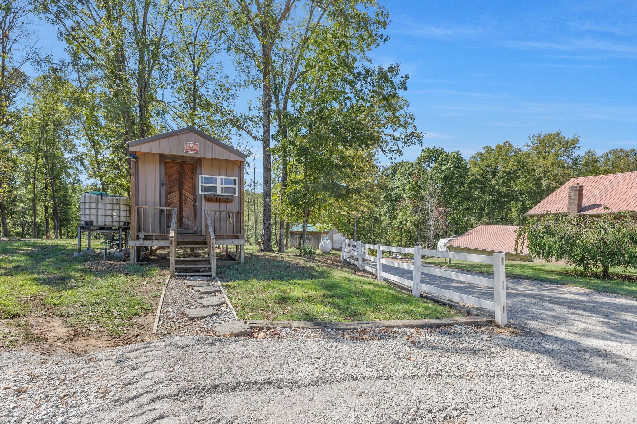 1745 Ennis Branch Road McEwen, TN 37101 - Photo 83 of 85 a front view of a house with a yard