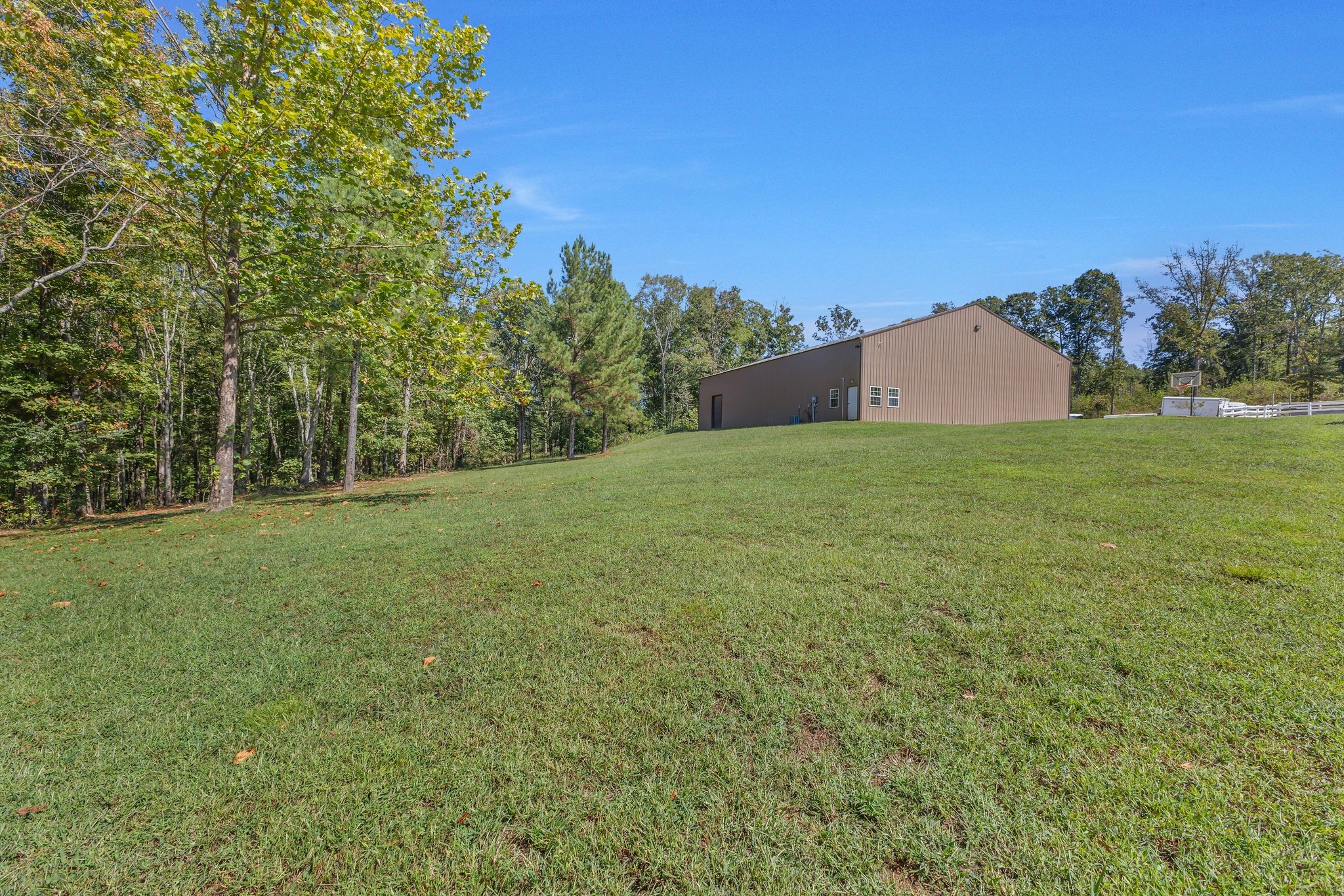 1745 Ennis Branch Road McEwen, TN 37101 - Photo 84 of 85 a view of a big yard with a house in the background