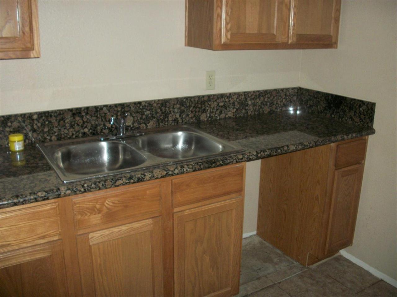 3511 East Baseline Road, Unit 1202 Phoenix, AZ 85042 - Photo 5 of 10 a close view of sink and tap
