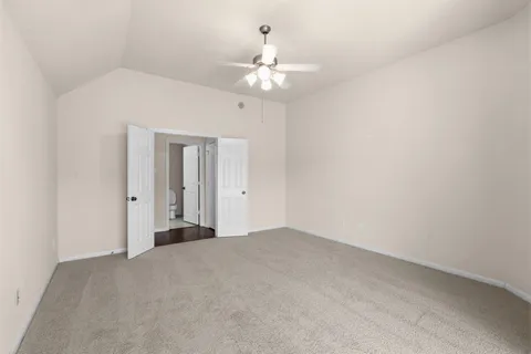 a very nice looking room with a chandelier fan