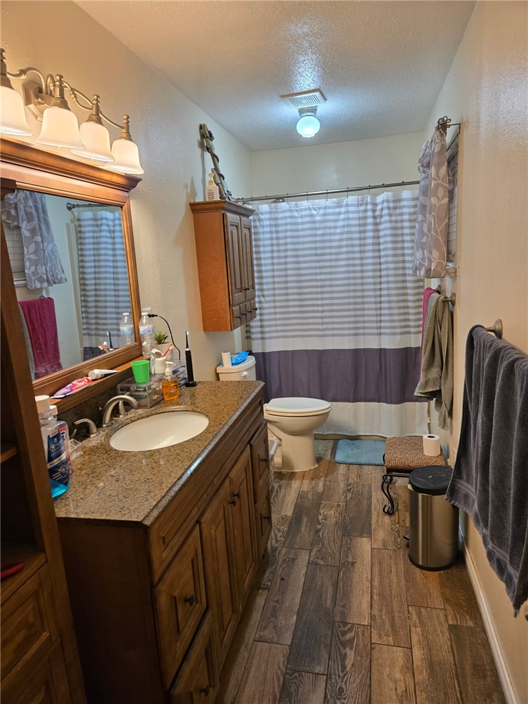 24772 County Road 360 Mathis, TX 78368 - Photo 9 of 30 a bathroom with a sink and a mirror