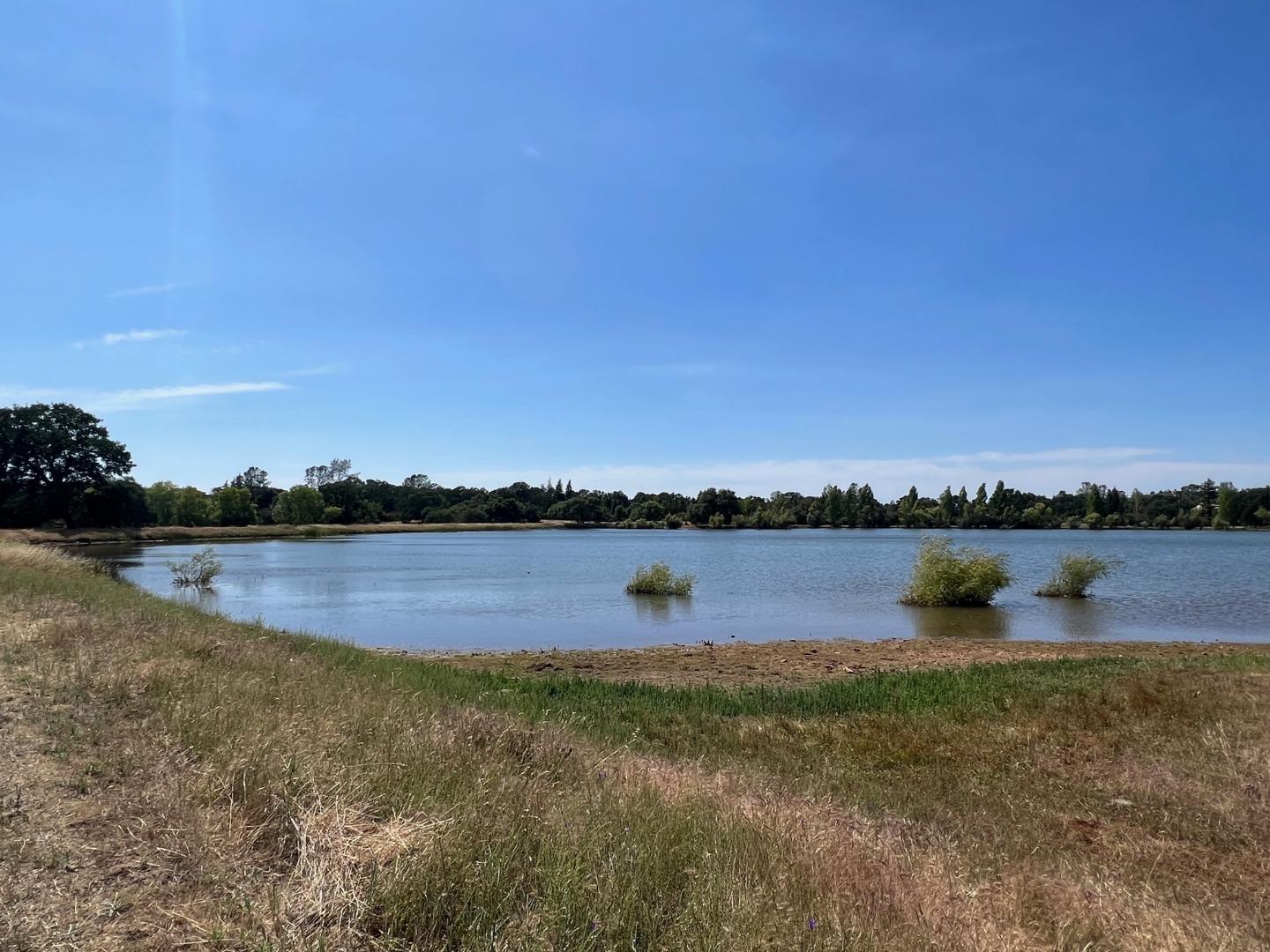 5800 Milton Ranch Road Shingle Springs, CA 95682 - Photo 5 of 21 a view of a lake with a lake view