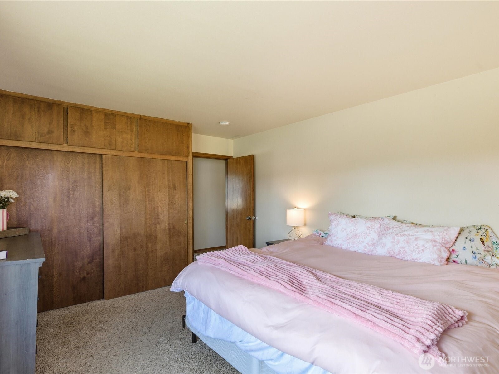 1417 Maple Street Sumner, WA 98390 - Photo 15 of 40 a bedroom with a bed and a dresser