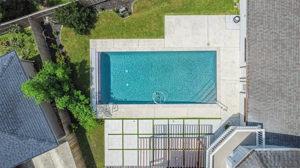 a view of a house with a swimming pool