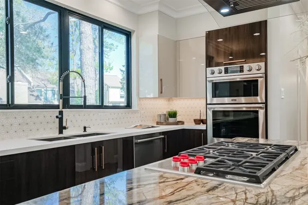 a living room with furniture potted plant and a window