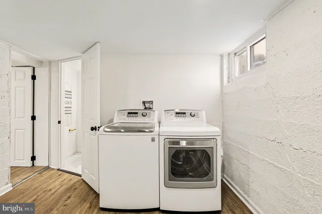 a utility room with dryer and washer