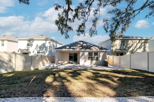 a view of a house with a patio