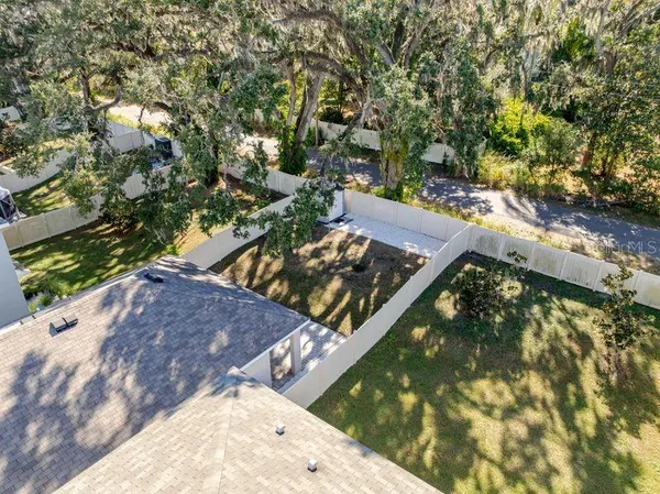 an aerial view of residential building and parking space