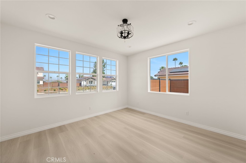 5978 Copperfield Avenue Riverside, CA 92506 - Photo 16 of 37 a view of an empty room with a window