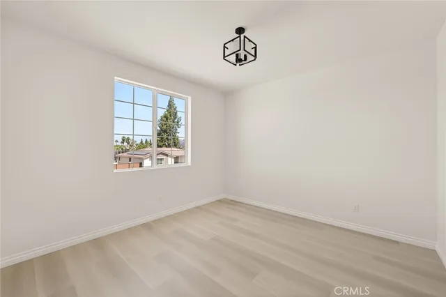 a bathroom with a double vanity sink toilet and shower