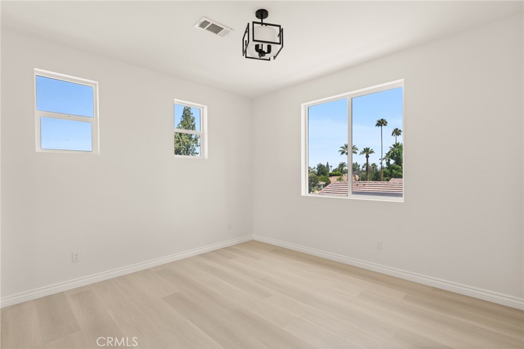 5978 Copperfield Avenue Riverside, CA 92506 - Photo 34 of 37 an empty room with a window
