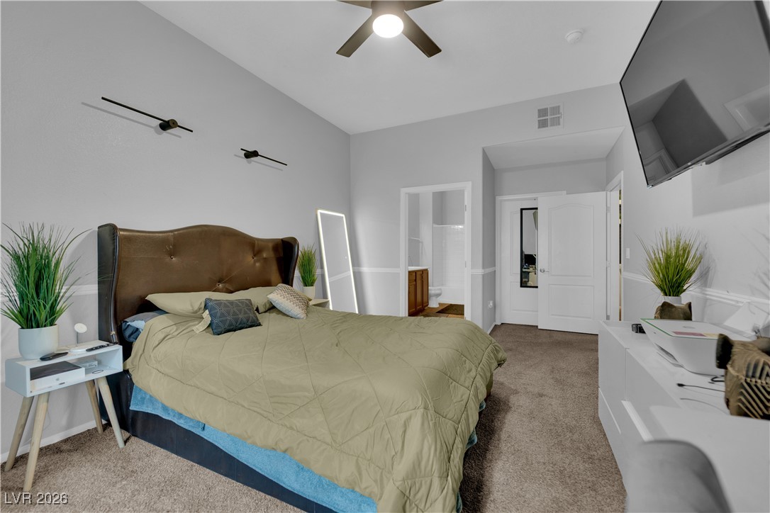 2305 West Horizon Ridge Parkway, Unit 3512 Henderson, NV 89052 - Photo 8 of 29 Bedroom featuring carpet, ceiling fan, and ensuite bathroom