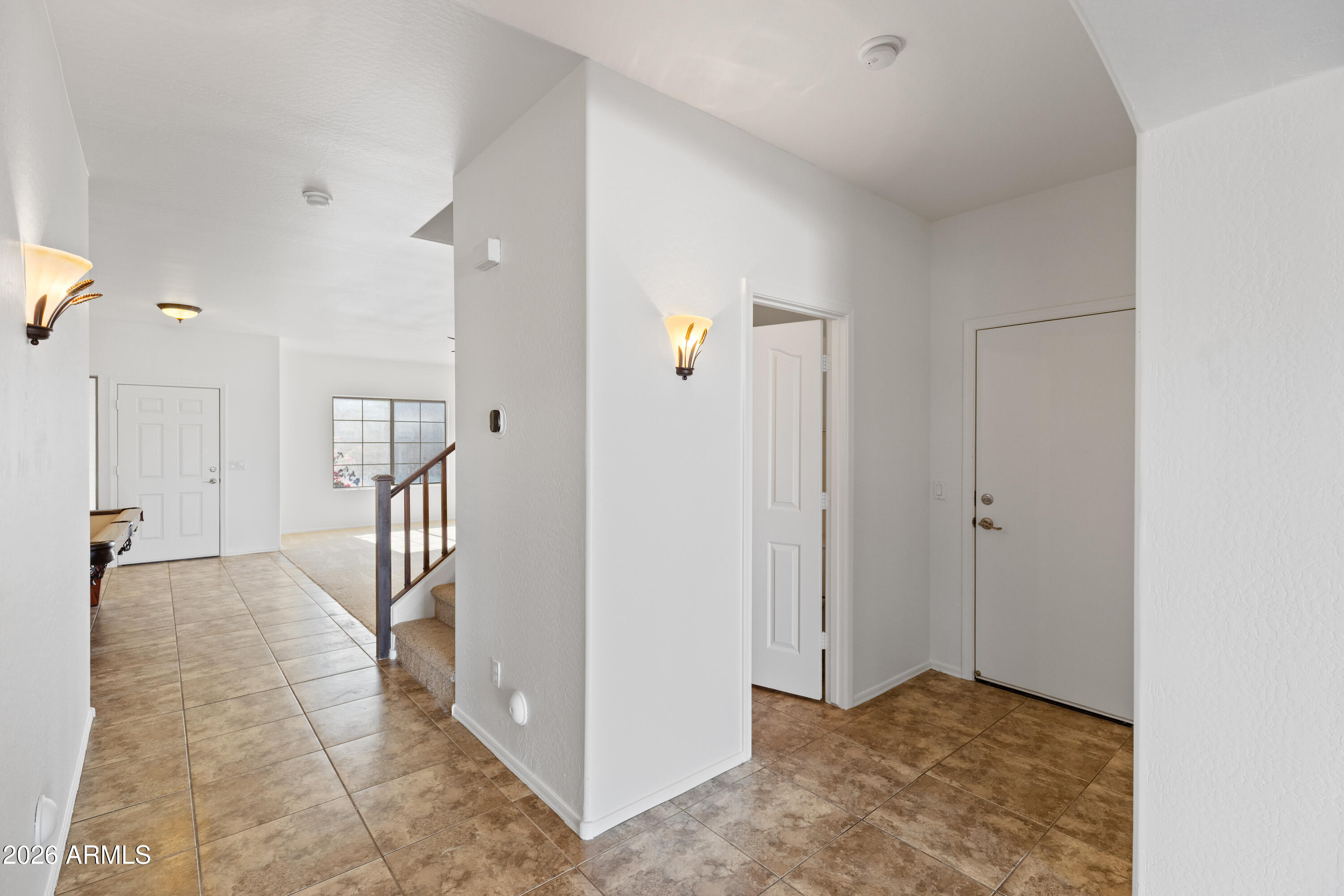 9840 Tangerine Road Florence, AZ 85132 - Photo 22 of 38 a view of a hallway with closet area