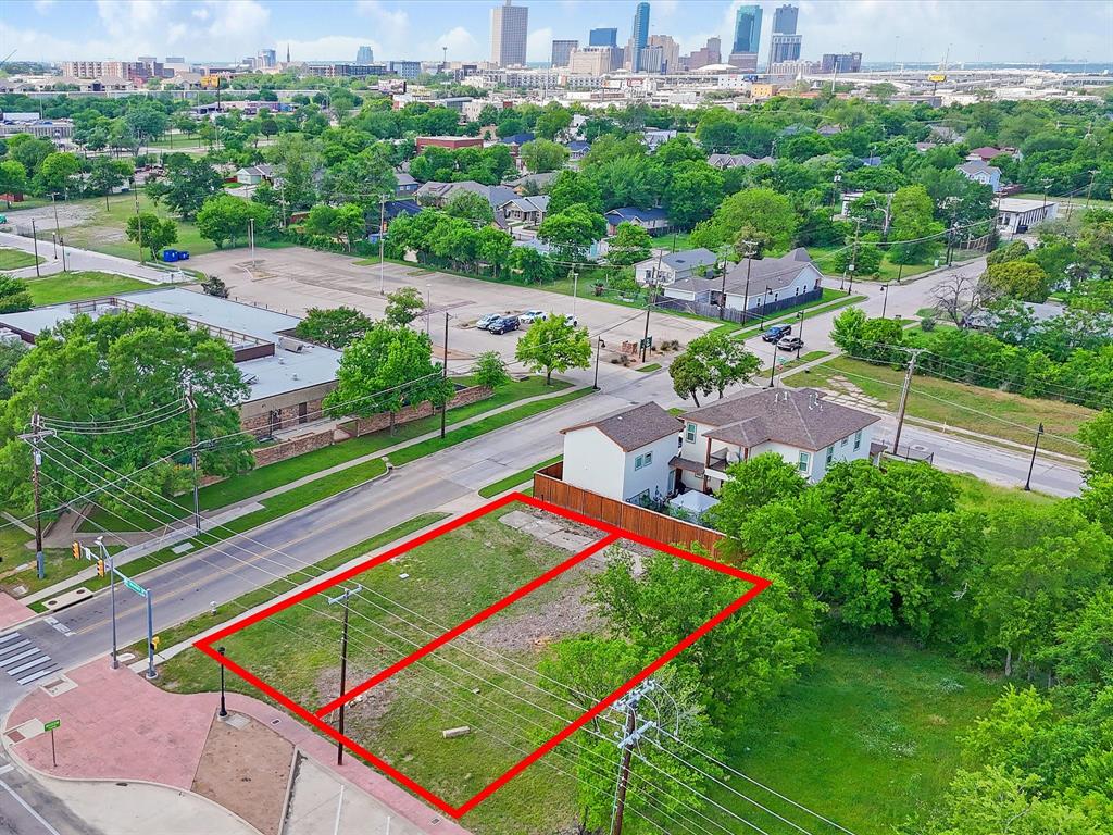 1003 East Rosedale Street Fort Worth, TX 76104 - Photo 3 of 15 an aerial view of a tennis ground and a houses