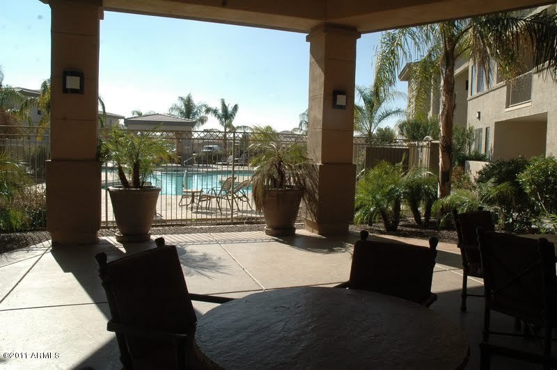 3330 South Gilbert Road, Unit 1039 Chandler, AZ 85286 - Photo 1 of 5 View from Club House of Pool & Unit 1039
