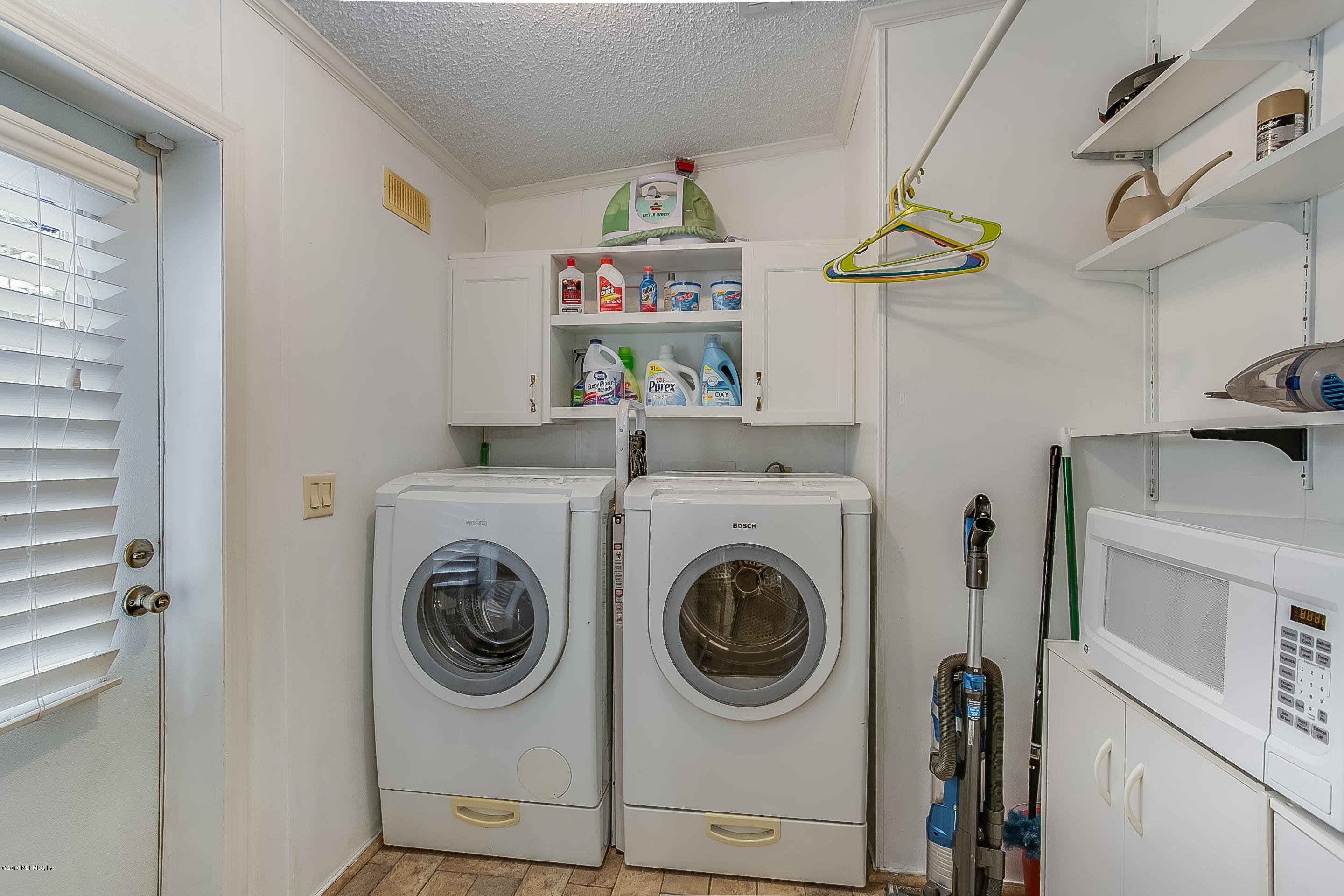 13278 Grover Road Jacksonville, FL 32226 - Photo 20 of 26 a utility room with dryer and washer