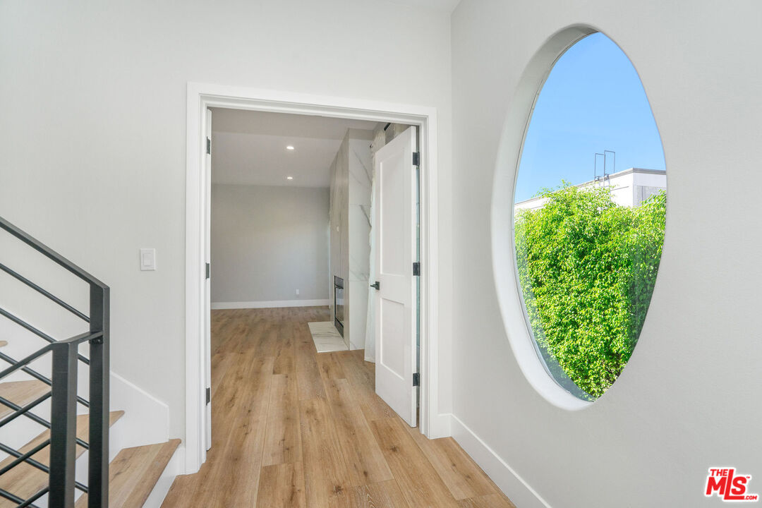 5923 Etiwanda Avenue, Unit 106 Tarzana, CA 91356 - Photo 12 of 27 wooden floor in a gallery
