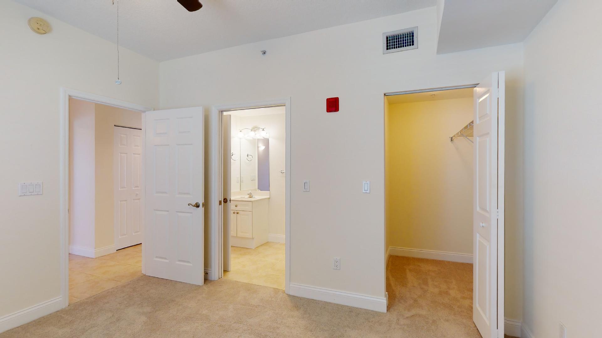 125 Pulsipher Avenue, Unit 402 Cocoa Beach, FL 32931 - Photo 28 of 34 a view of a livingroom and a hallway