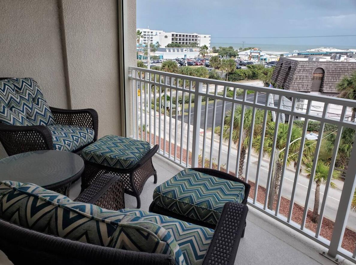 125 Pulsipher Avenue, Unit 402 Cocoa Beach, FL 32931 - Photo 6 of 34 a view of a living room and wooden floor