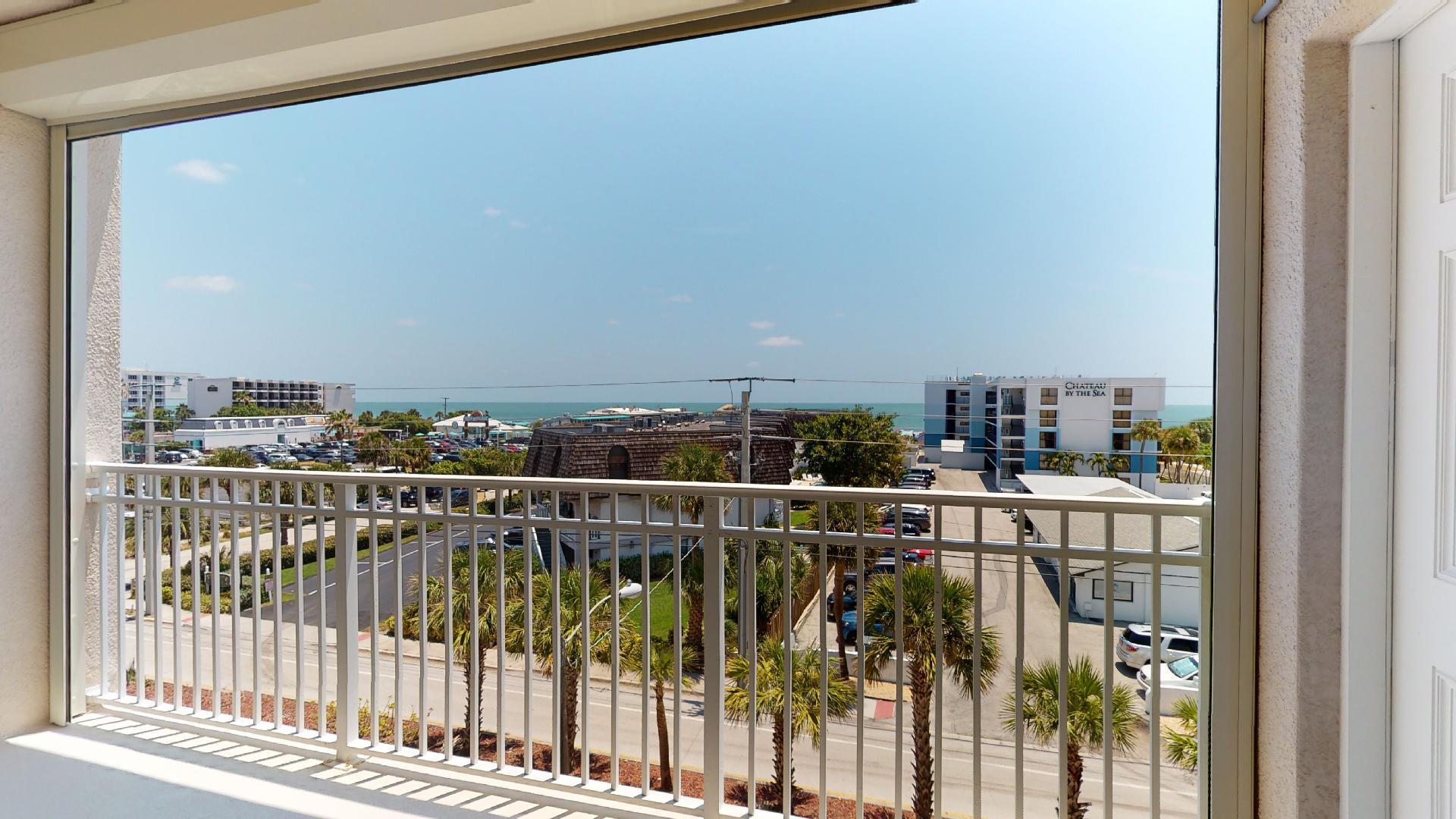 125 Pulsipher Avenue, Unit 402 Cocoa Beach, FL 32931 - Photo 7 of 34 a view of a balcony with city view