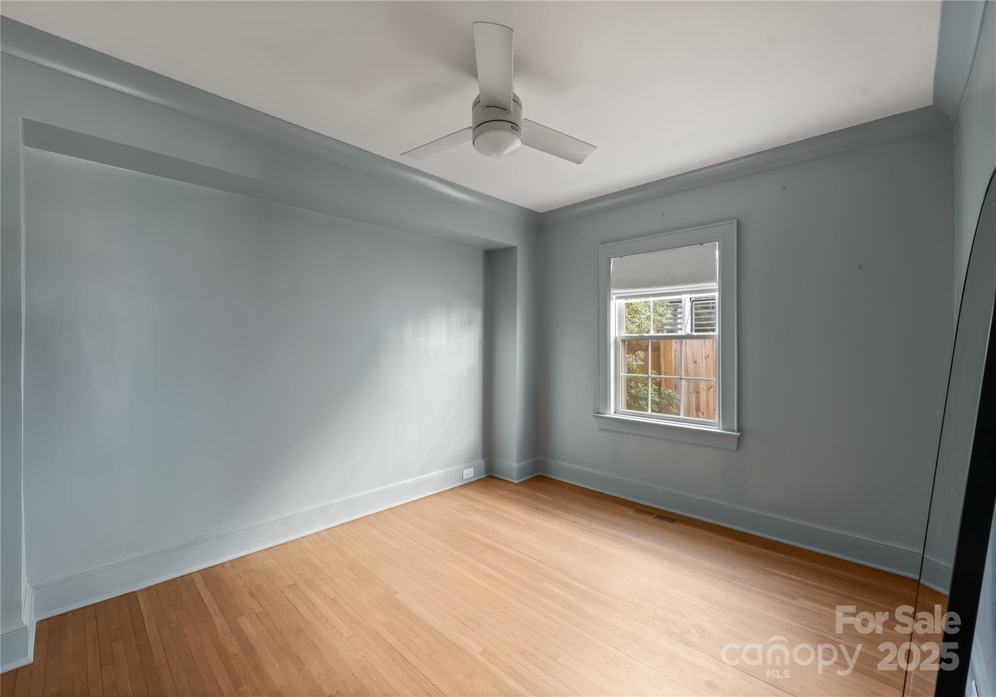 3415 Holt Street Charlotte, NC 28205 - Photo 32 of 48 an empty room with a window