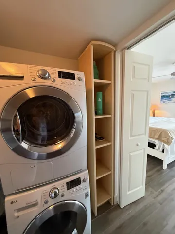 a kitchen with stainless steel appliances a sink and a refrigerator