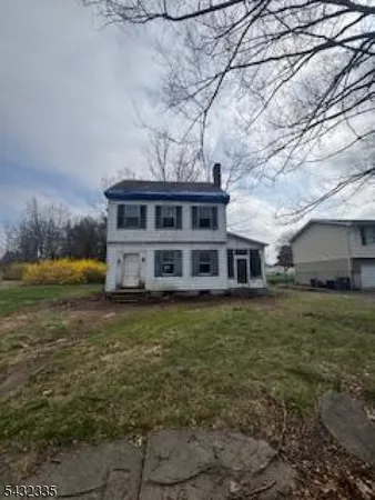 a house view with a garden space
