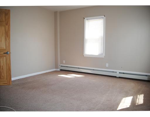 1573 Centerville Road Warwick, RI 02886 - Photo 5 of 8 Bedroom. One of 3 bedrooms in first floor unit. Both units have same layout.