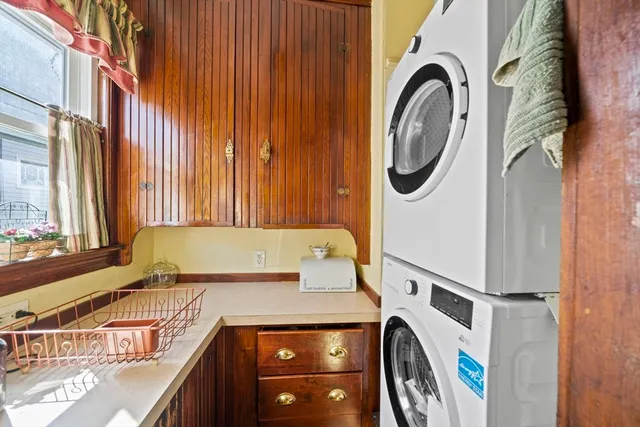 a kitchen with stainless steel appliances granite countertop a stove and a refrigerator