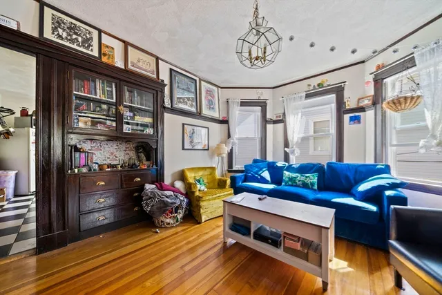 a bedroom with bed and a window