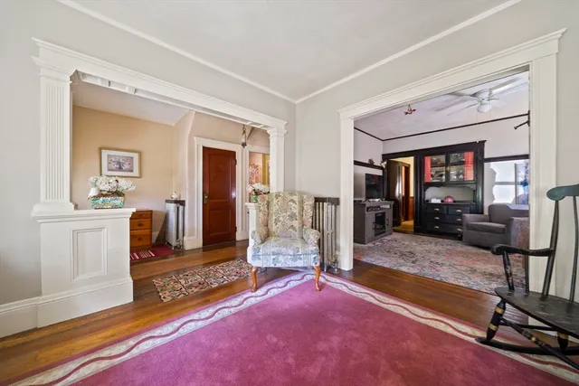 a view of a livingroom with gym equipment