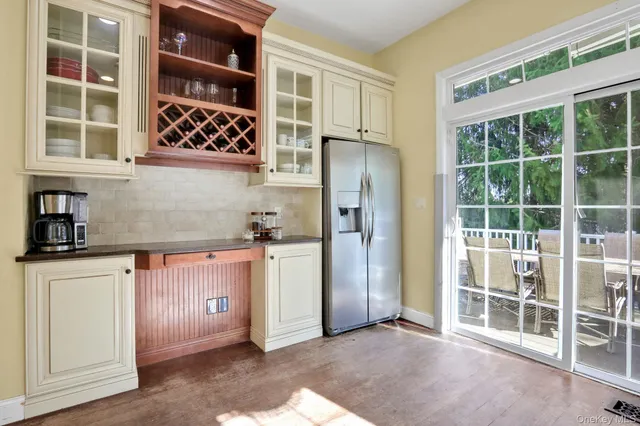 a kitchen with stainless steel appliances a refrigerator and a sink