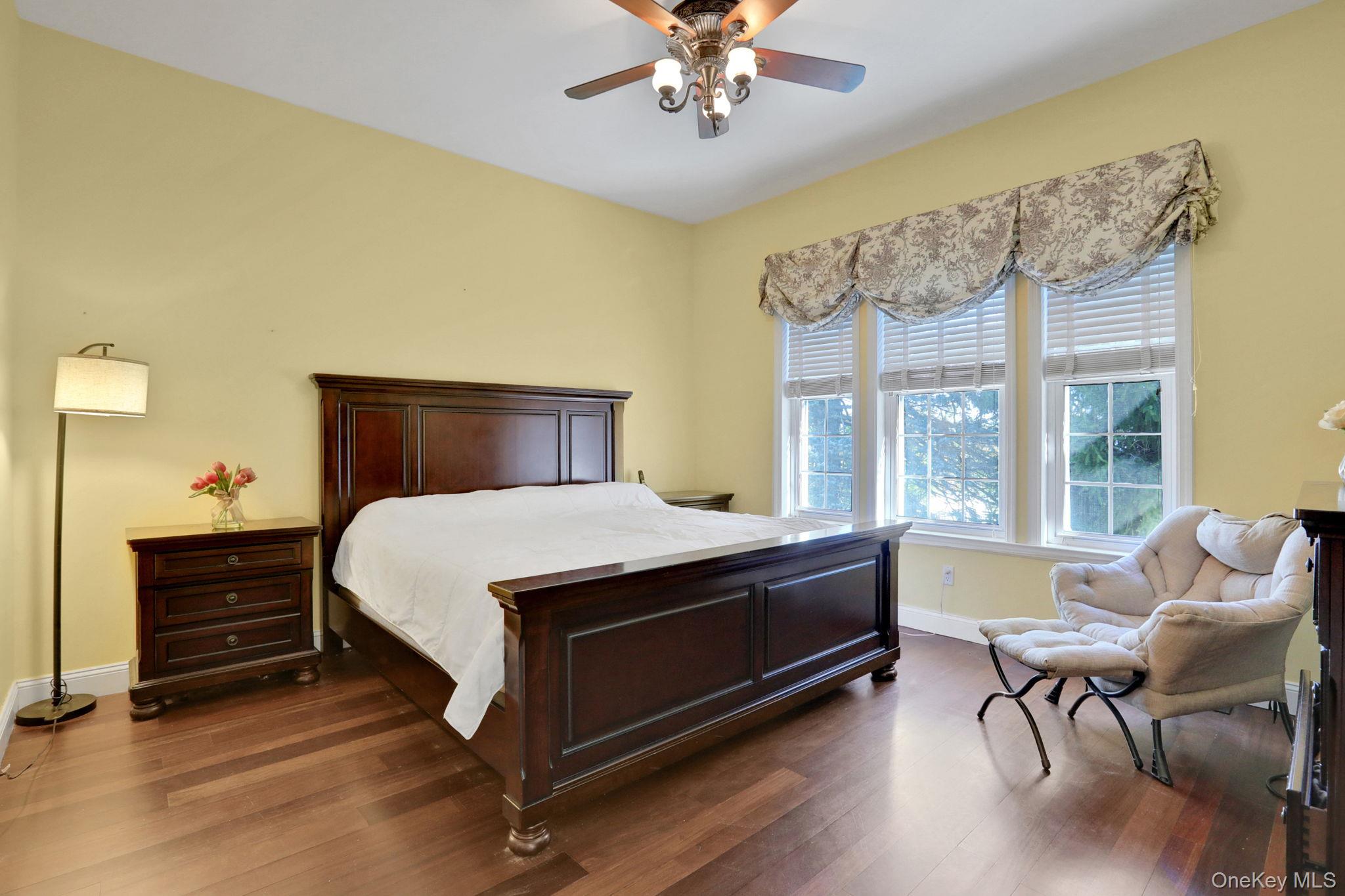 26 Reunion Road Rye Brook, NY 10573 - Photo 16 of 48 a bed room with a bed and a chair