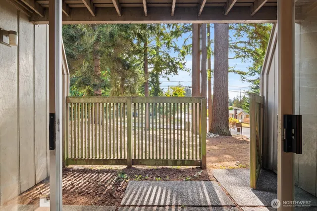 a view of balcony with yard