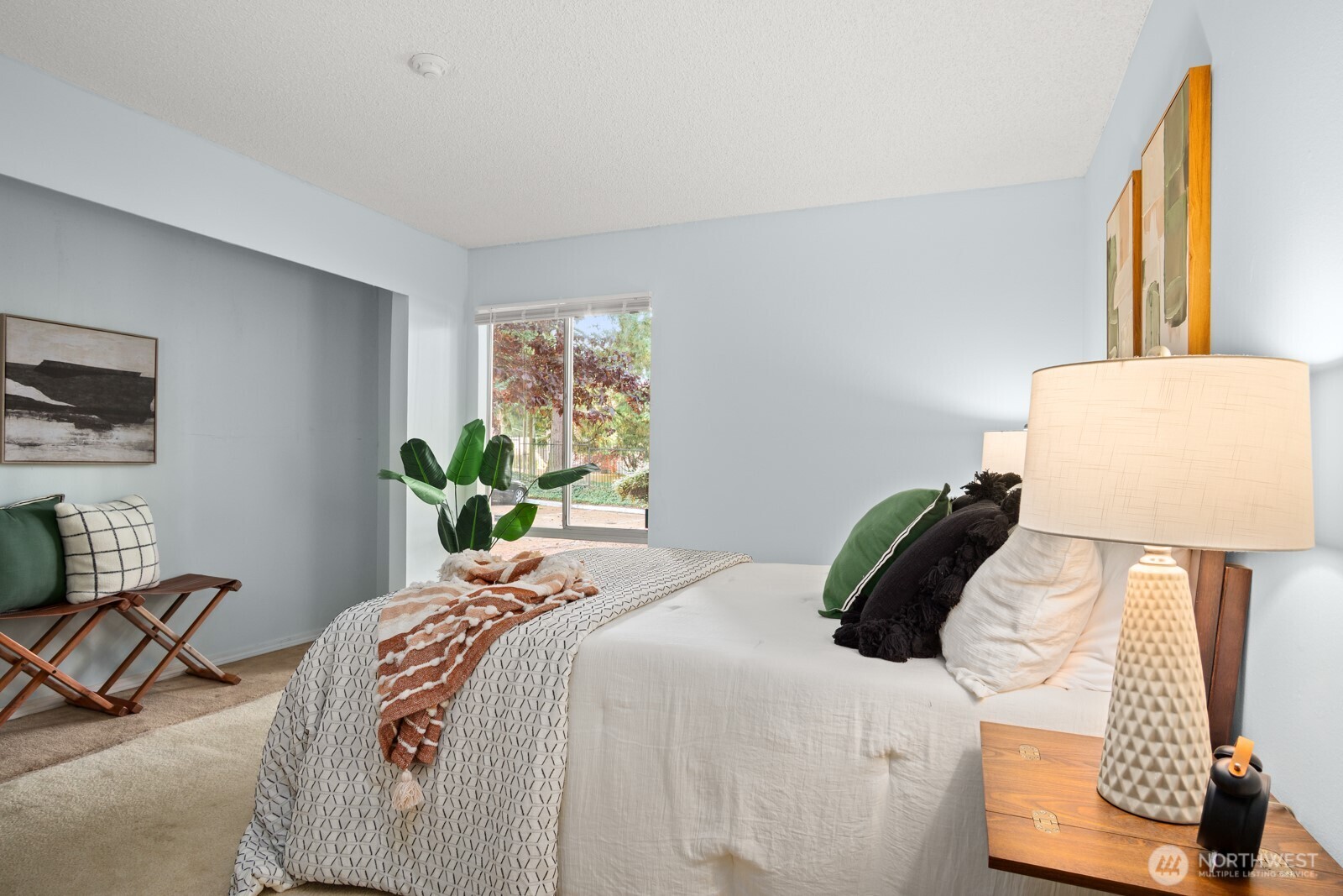 4803 180th Street Southwest, Unit A101 Lynnwood, WA 98037 - Photo 10 of 24 a bedroom with a bed and a window