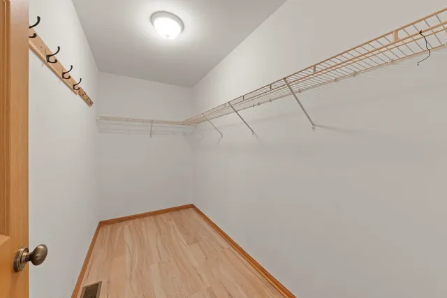 a view of a room with racks on the wall