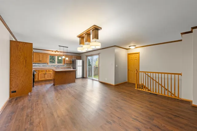 a view of kitchen with wooden floor