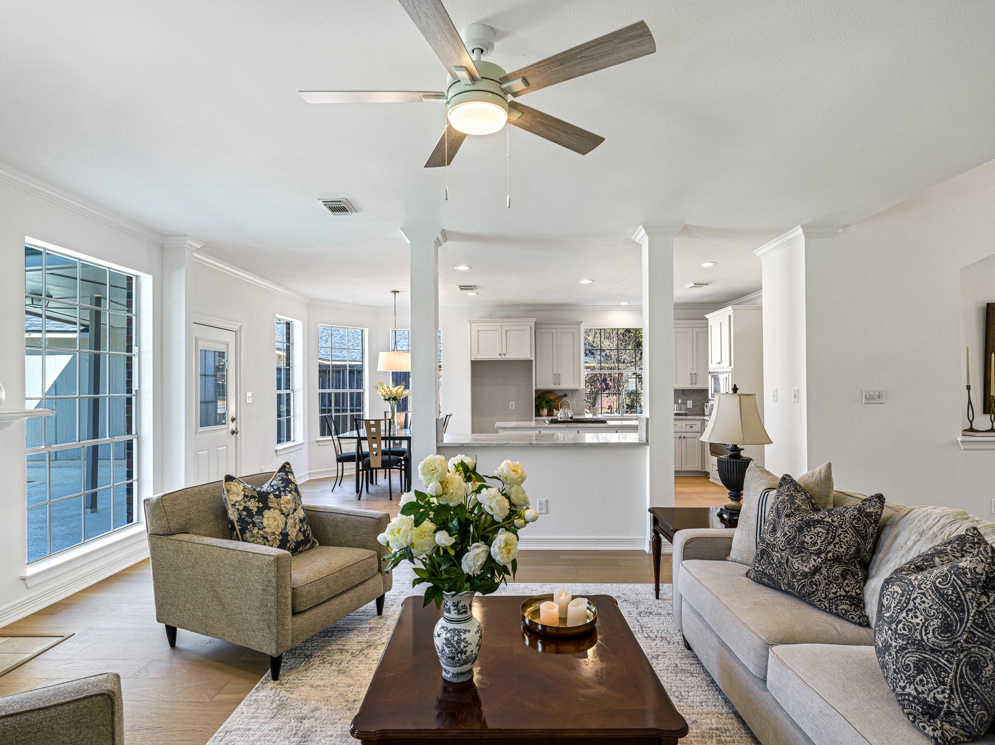 1910 Landon Point Circle Katy, TX 77450 - Photo 12 of 37 Another view of the family room located off the kitchen. Flooring continues from the front of the home through the family room and into the kitchen.
