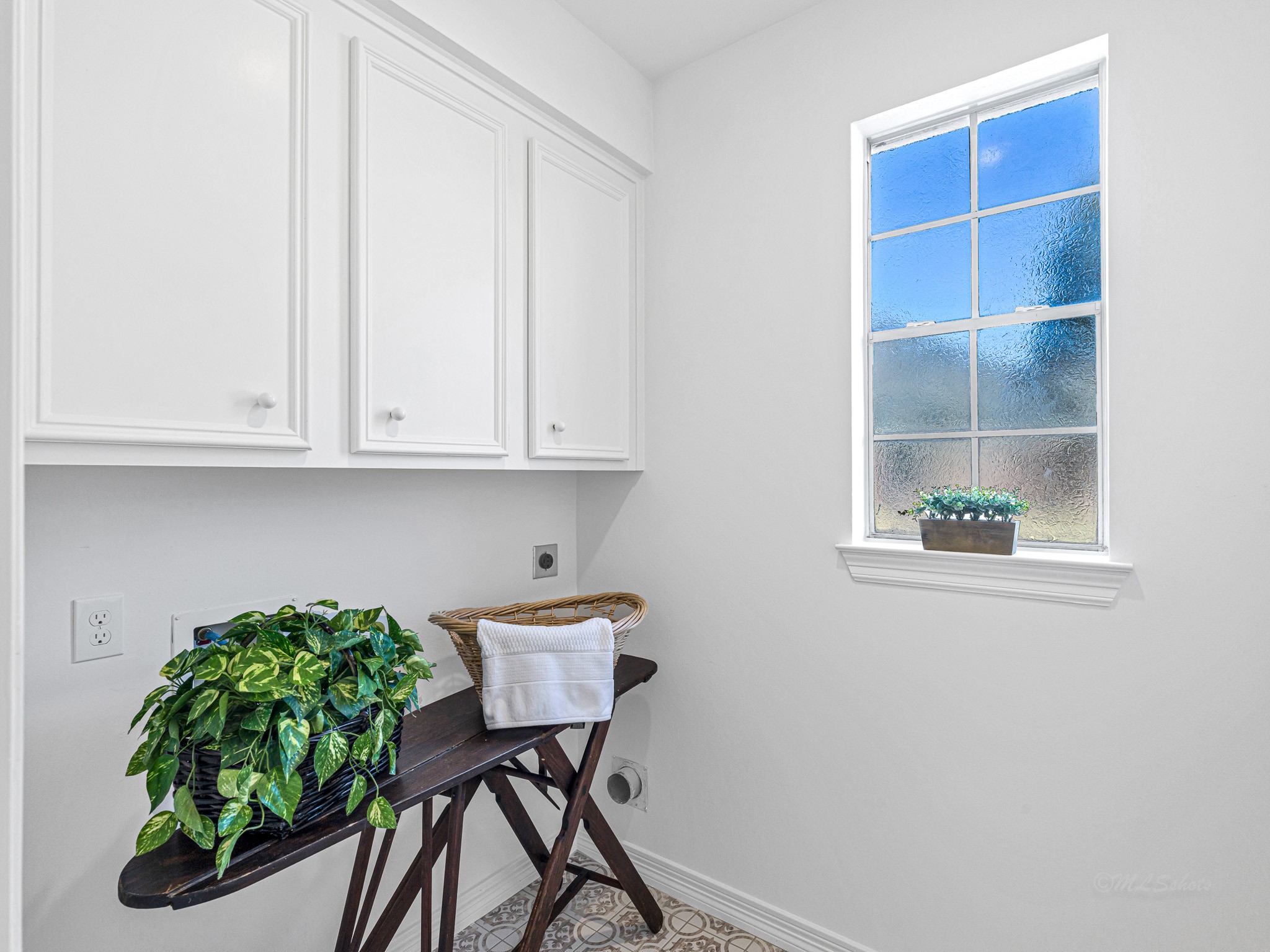 1910 Landon Point Circle Katy, TX 77450 - Photo 31 of 37 Laundry room features new floor tile, neutral paint, new recessed lighting...